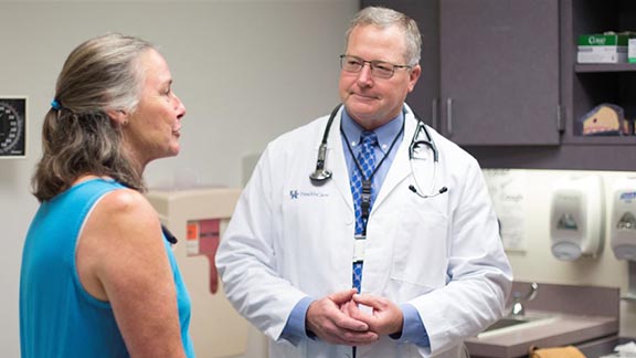 Woman talking to her doctor