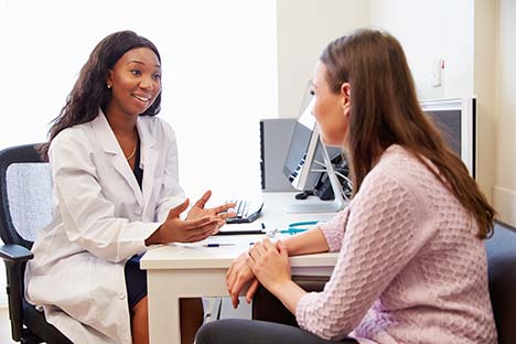 Doctor talking to her patinet about contraception