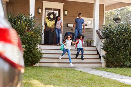 Family leaving home for vacation